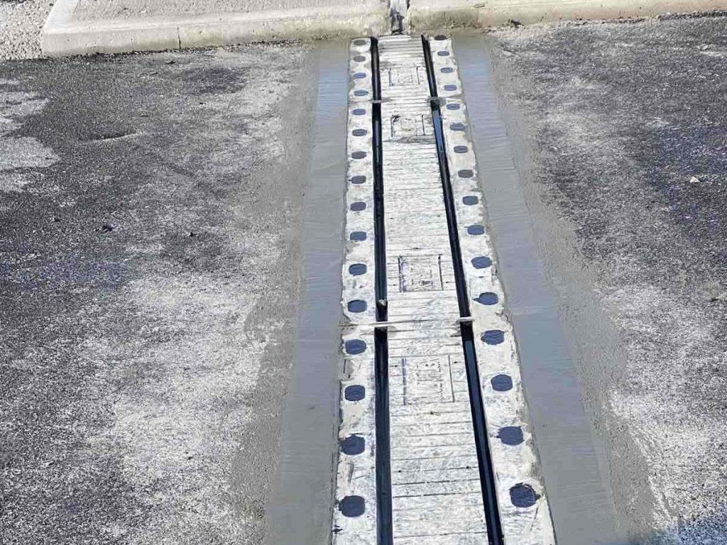 Installation of Elastomeric Expansion Joints on a Newly Constructed ...