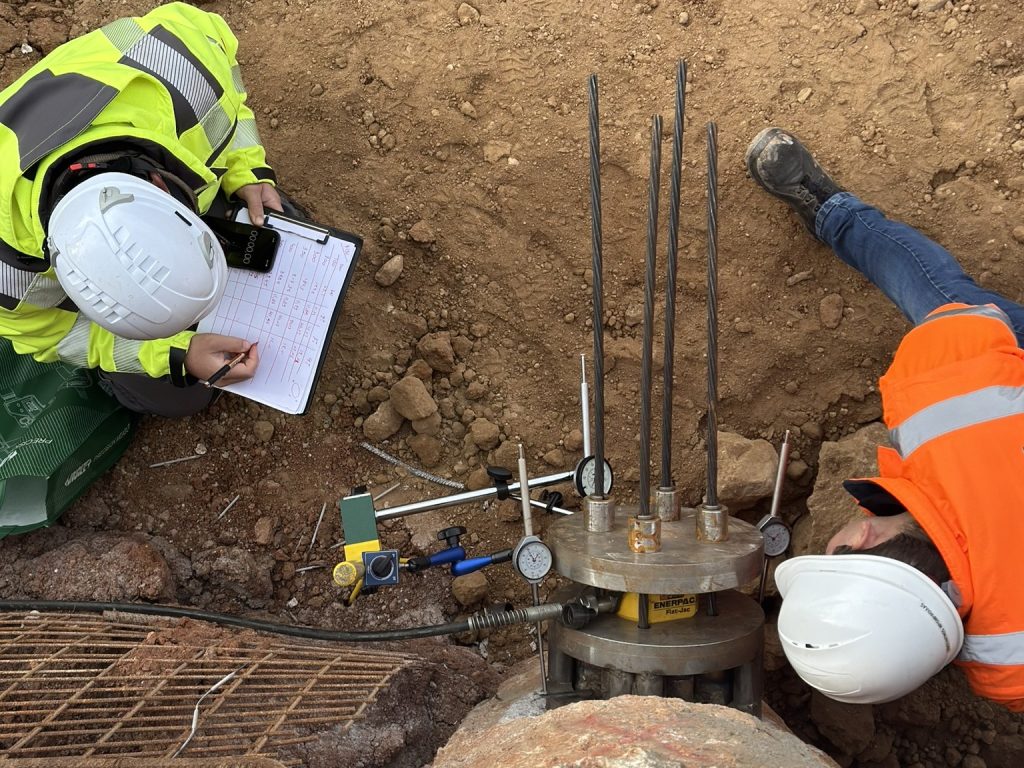 Evaluation of In‑service Stressing Force on Existing Temporary Ground Strand Anchors